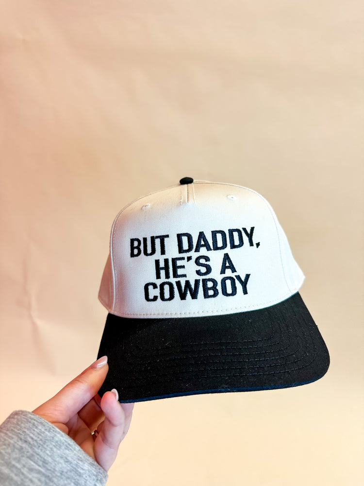 But Daddy He’s a Cowboy black and tan hat